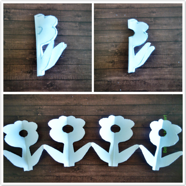 然后将小花朵的图案剪下来,展开---美丽的四朵小花花就出现在你的眼前